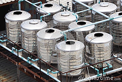 Stainless steel water tanks on rooftop Stock Photo