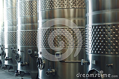 Stainless steel wine fermentation tanks. Stock Photo