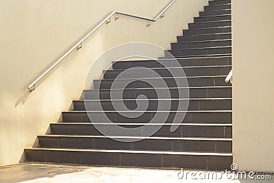 Stair structure and stainless roll bar steel with sunlight Stock Photo