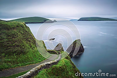 Staircase leading to the Dunquin Pier in Ireland Stock Photo