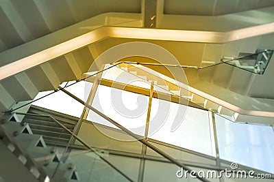 Staircase open in the interior of the atrium space, perspective, blurred background Stock Photo