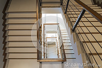 Staircase with wooden rail Stock Photo