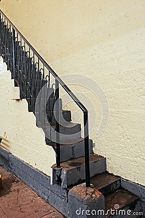 Stairs and the banister create geometrical shapes bank of stone wall at river Godavari Editorial Stock Photo