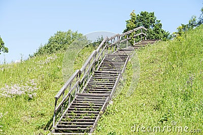 Stairs climb up the road to the sky Stock Photo