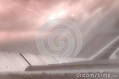 Stairs high to a beautiful soft pink sky, the road to heaven Stock Photo