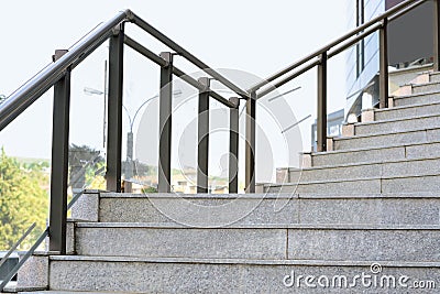 Stairs with metal handrailing outdoors on sunny day Stock Photo