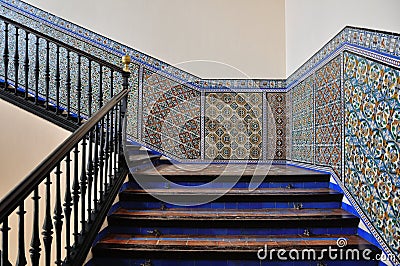 Stairs. Moorish tiles on a wall in the Alcazar of Seville, Spain Stock Photo