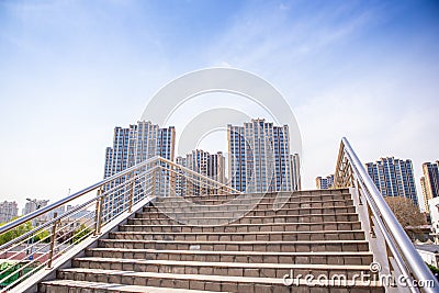 Stairs on a pedestrian bridge Stock Photo