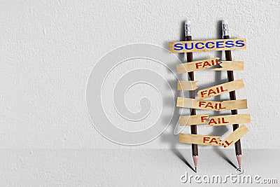 Stairs with pencil for effort and challenge in business to be achievement and successful concept Stock Photo