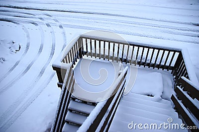 Stairs to a Snow Covered Driveway Stock Photo