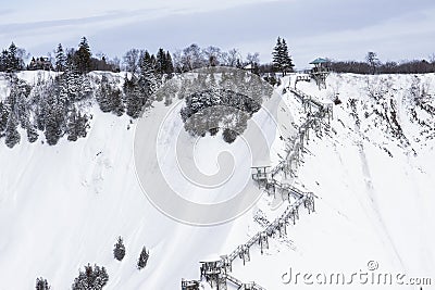 Stairway leading up a snowy mountain Stock Photo