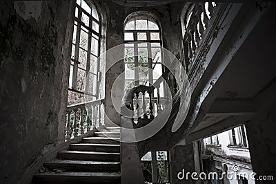 Stairway in old abandoned hotel Stock Photo