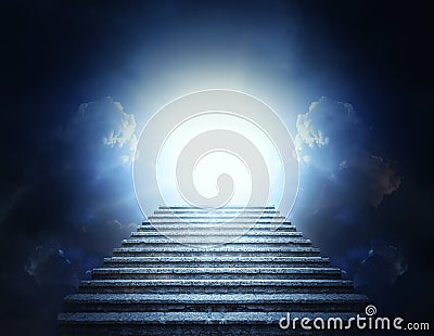 Stone steps into clouds and light. Stairway to Heaven. Stock Photo