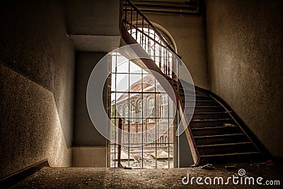 Stairways in an abandoned decaying building in europe Stock Photo