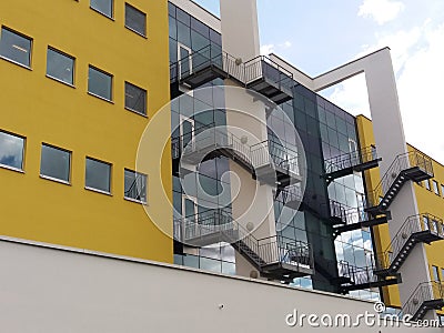 Stairways between yellow walls Stock Photo