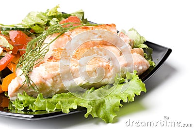 Stake from a salmon with vegetables Stock Photo