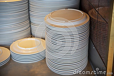 Staked empty plates for food Stock Photo