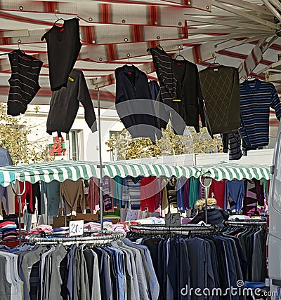 Stall with clothing at an outdoor commercial fair Stock Photo