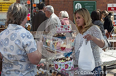 Stall holders and shoppers at Tynemouth Market. Editorial Stock Photo