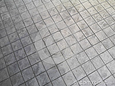 Stamp concrete black color hardener printing patterns on the cement or mortar surface block shape Square pattern material rough Stock Photo