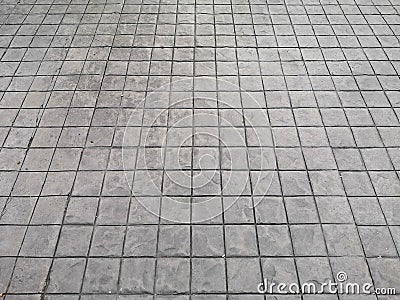 Stamp concrete black color hardener printing patterns on the cement or mortar surface block shape Square pattern material rough Stock Photo