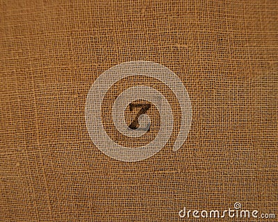 Stamp letters on linen fabric. Letter Z. Stock Photo