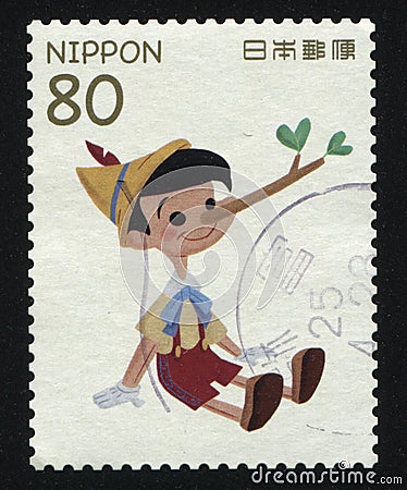 Stamp Pinocchio with branch Editorial Stock Photo