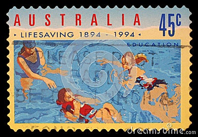 Stamp printed in Australia shows the People in Water Editorial Stock Photo