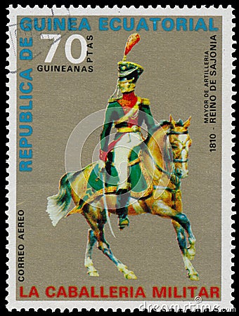 Stamp printed in the Equatorial Guinea shows army uniform of military Editorial Stock Photo