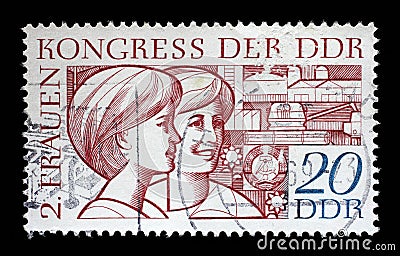 Stamp printed in GDR, shows two young women, devoted to the Second Congress of Women Editorial Stock Photo