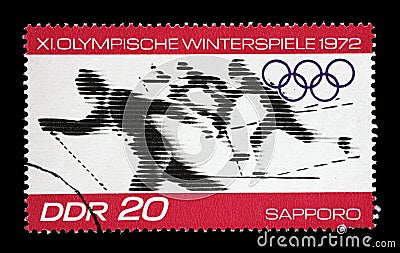 Stamp printed in GDR shows Winter Olympic Games - Sapporo, Japan Editorial Stock Photo