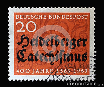 Stamp printed in Germany dedicated to 400 years of the Heidelberg Catechism, containing the doctrine of the reformed church Editorial Stock Photo