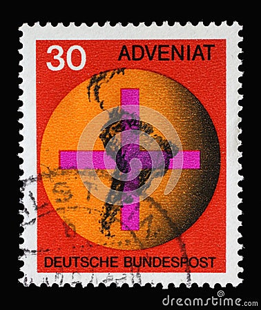 Stamp printed in Germany showing Cross in front of a globe with map of South America Editorial Stock Photo