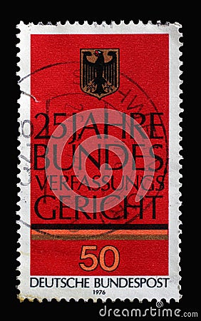 A stamp printed in Germany shows German Eagle, 25th Anniversary of Federal Constitutional Court in Karlsruhe Editorial Stock Photo
