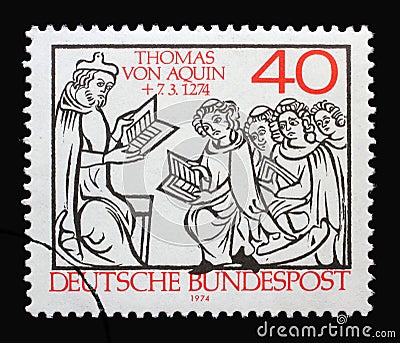 A stamp printed in Germany shows Thomas Aquinas Teaching, 700th Death Anniversary of Thomas Aquinas, scholastic philosopher Editorial Stock Photo