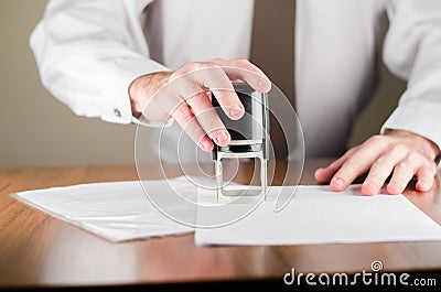 Stamp a seal on the table Stock Photo