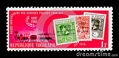 Stamps of 1915 and steam mail train, 65th Anniversary of Togolese Postal Services serie, circa 1962 Editorial Stock Photo