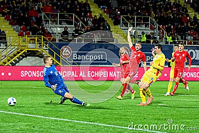 Stancu (Romania) scoring a goal against the Lithuanian football team Editorial Stock Photo