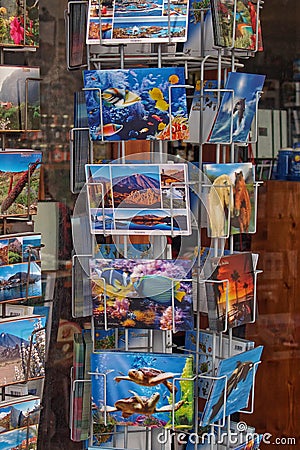 Stand with colorful postcards in a souvenir shop on the Spanish island of Tenerife Editorial Stock Photo