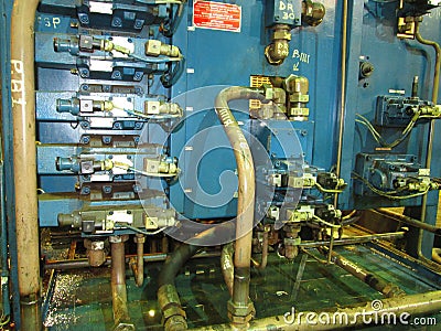 Stand of industrial hydraulic valves. Editorial Stock Photo