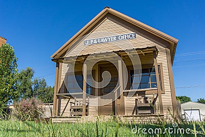 Stand-a-lone simple building exterior for office of JP and lawyer Editorial Stock Photo