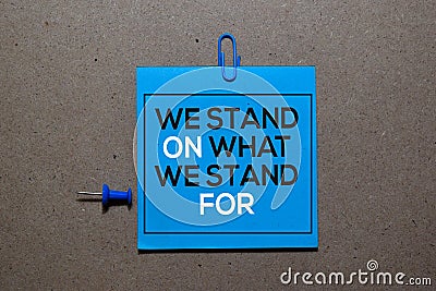 We Stand On What We Stand For write on sticky notes isolated on Office Desk Stock Photo
