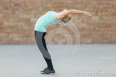 Standing Backward Bend pose Stock Photo