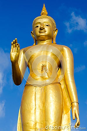 Standing Buddha statue Stock Photo