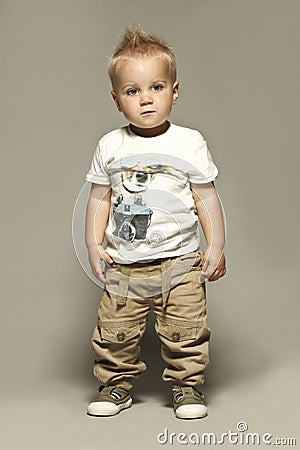 Standing caucasian blond boy child portrait Stock Photo