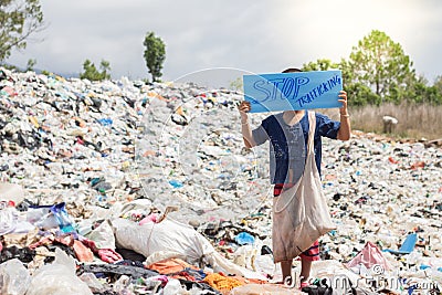 Standing child holding a sign, anti-trafficking, stopping violen Editorial Stock Photo