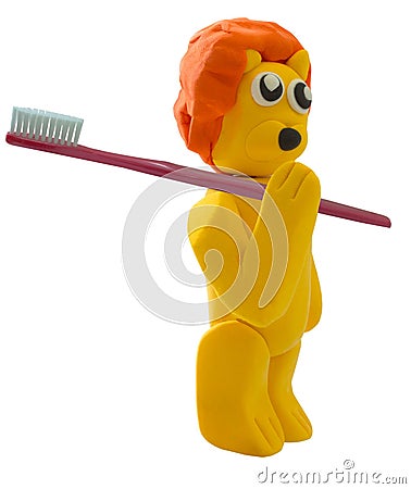 Standing lion and toothbrush in concept dentist Stock Photo