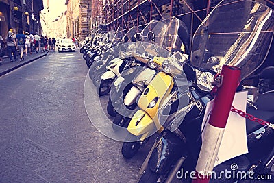 Standing in a row modern fashionable scooters Editorial Stock Photo