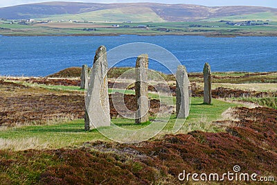 Standing stones in sunshine in the Ring of Brodgar in Orkney, Scotland, UK Stock Photo