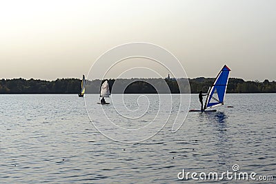 Standup paddleboarding are on the river Moscow, Strogino Editorial Stock Photo